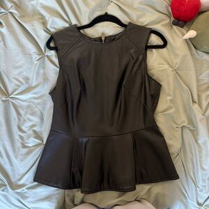 leather black shirt with zipper in the back and a flowy bottom